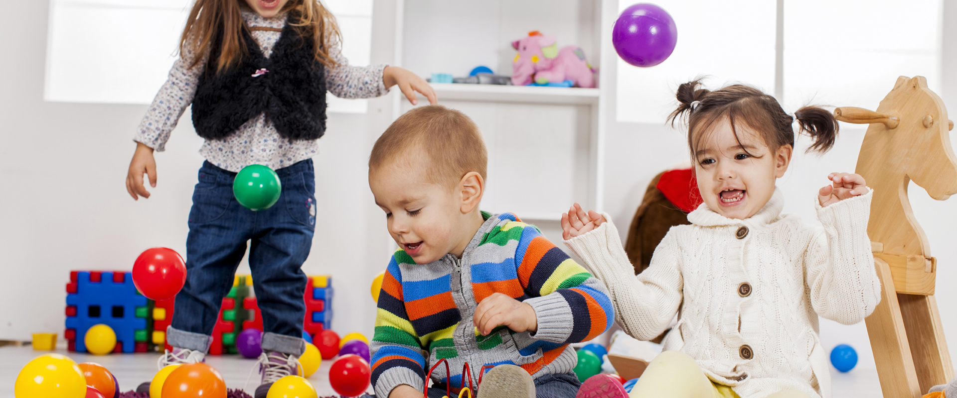 Creative Paths Learning Studio in Deerfield, IL nurtures toddlers playing in a ball pit.